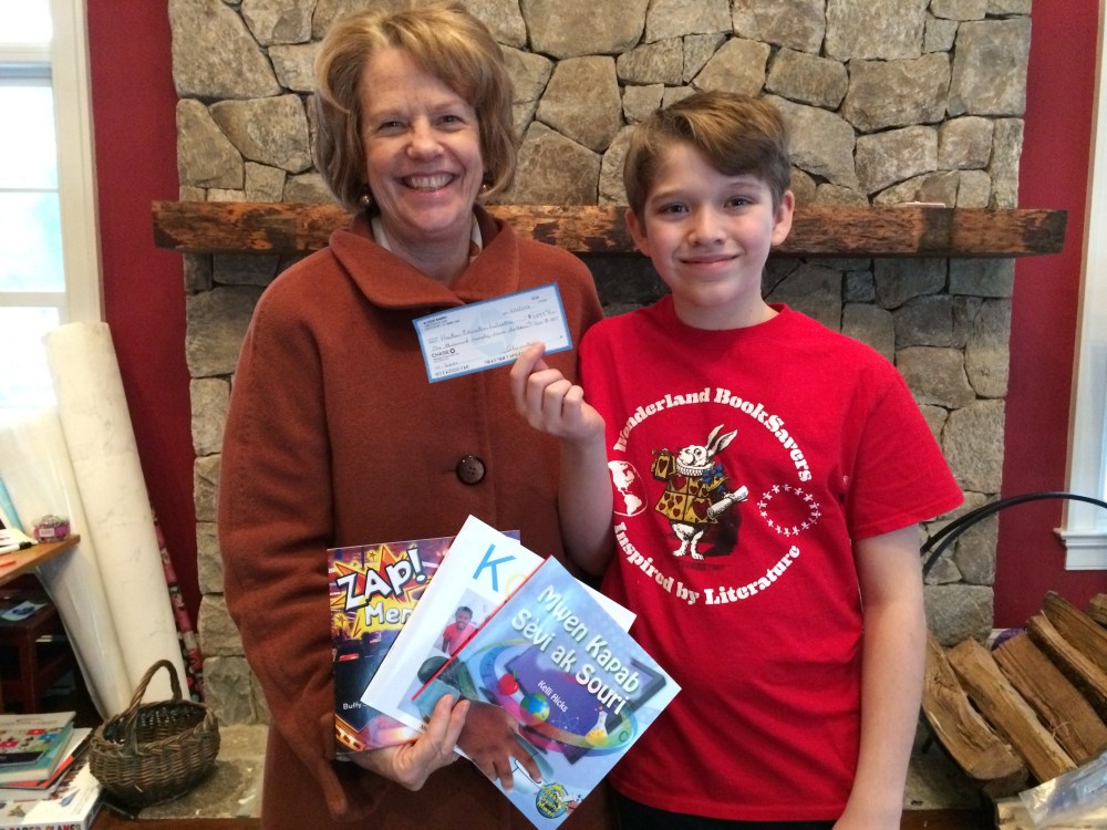 Brooks with Susy and HEI Check