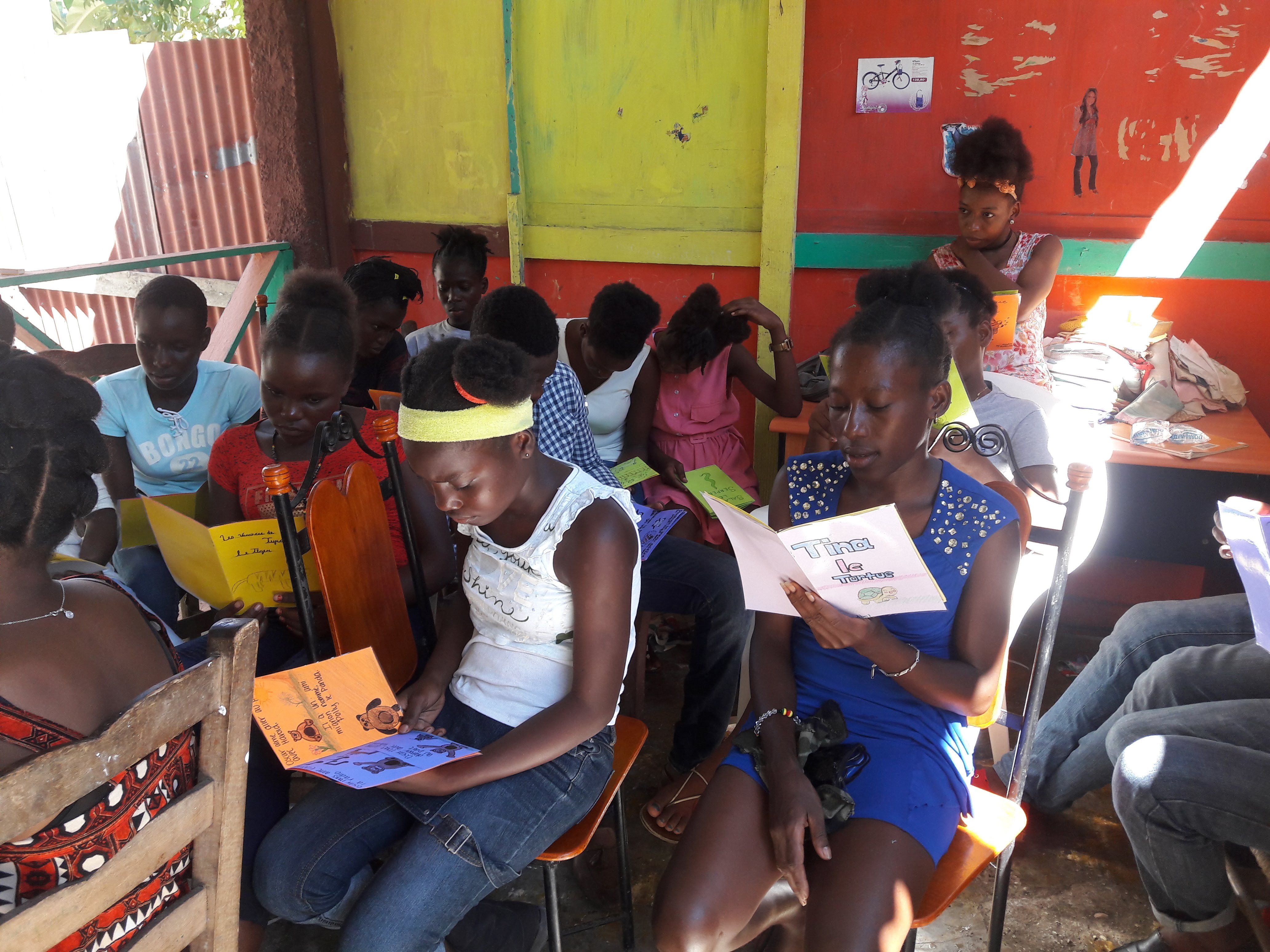 Haitian kids reading books WBS 1
